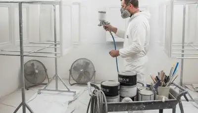 Professional cabinet painting in Lancaster, PA using spray techniques for smooth, durable kitchen finishes